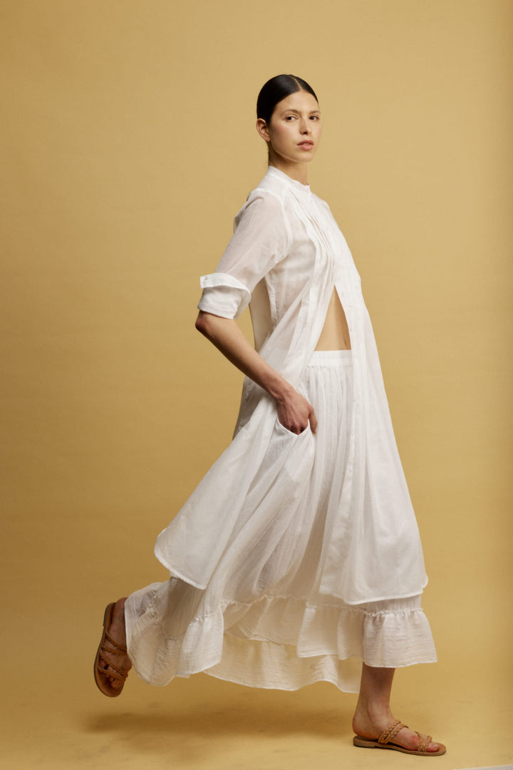 Roly חצאית מידי לבנה בעלת כיסים וסיומת מלמלה א-סימטרית מבד נעים משכית