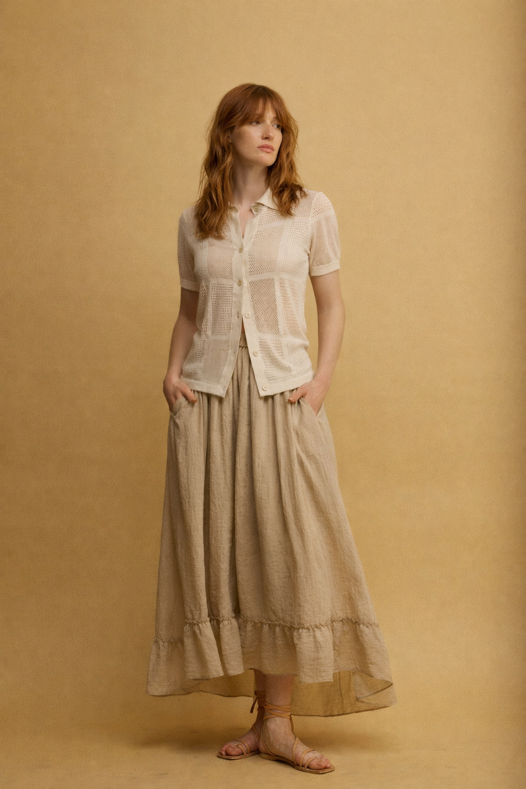 Roly חצאית מידי בז' בעלת כיסים וסיומת מלמלה א-סימטרית מבד נעים משכית